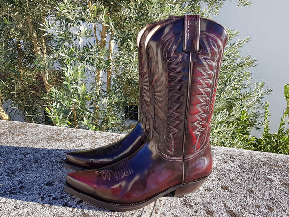 Men's Cowboy boots in leather with shiny dark red polish